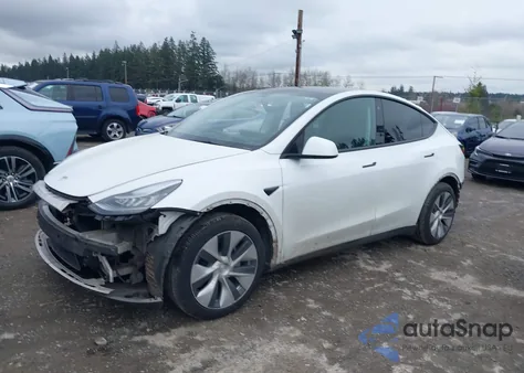 2022 Tesla Model Y Long Range Dual Motor All-Wheel Drive z USA, uszkodzony, nr VIN 7SAYGAEE2NF570912